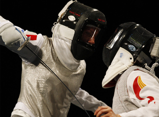 Illustration for article titled The Tech Inside Olympic Fencers' Amazing Future-Warrior LED Helmets